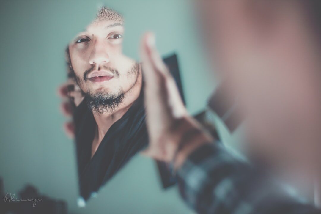 person looking in mirror confidently