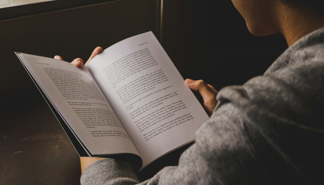 woman reading self help book
